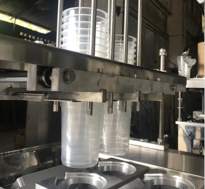 Automatic Paper Plastic Cups Filling and Sealing Machine for Water Juice Jelly Yogurt Production Line
